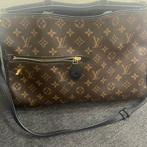 Women’s Louie Vuitton purse.